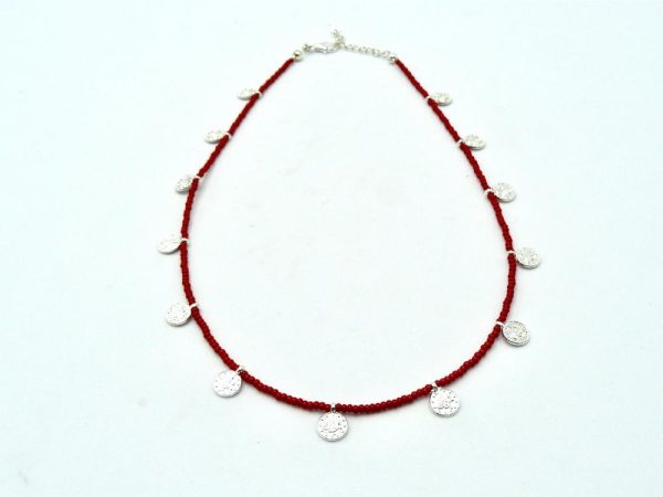 Silver plated brass necklace with Red coloured beads, ethnic coins and lobster clasp adjustable closure.
