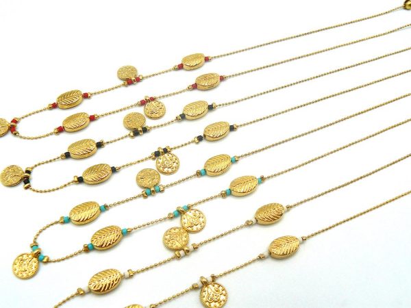 Four Gold Plated Brass Thin Chain Necklaces with Colored Beads, Shiny Gold Plated Brass Charms, Ethnic Coins and Lobster Clasp Adjustable Closure. One of the Necklaces has Black Beads. Another, White Beads. A Third Has Turquoise Colored Beads and The Last One, Red Beads.
