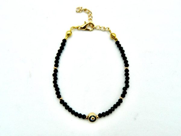 Gold-Plated Brass Bracelet With Black Beads and Lobster Clasp Adjustable Closure. The Central Bead Has an Eye-Like Pattern and is Encased in a Layer of Gold-Plated Brass