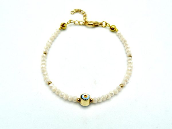Gold-Plated Brass Bracelet With White Beads and Lobster Clasp Adjustable Closure. The Central Bead Has an Eye-Like Pattern and is Encased in a Layer of Gold-Plated Brass