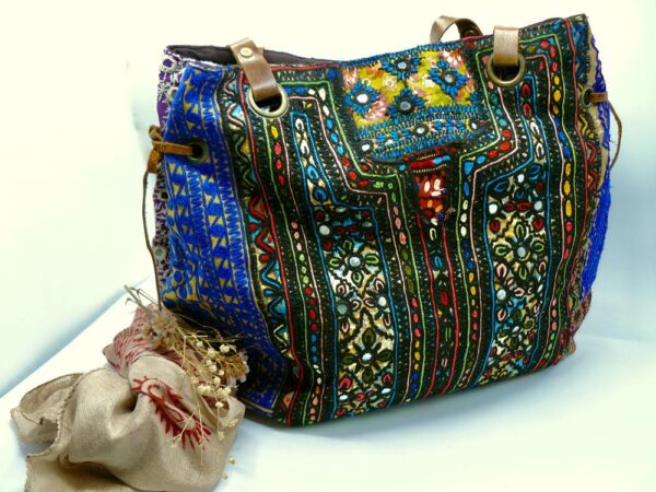 Handmade bag with ancient embroidered fabrics from the Rajasthan desert.