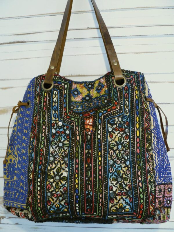 Handmade bag with ancient embroidered fabrics from the Rajasthan desert.